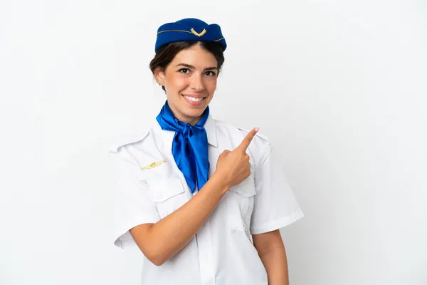 Aeromoça Avião Mulher Caucasiana Isolado Fundo Branco Apontando Para Lado — Fotografia de Stock