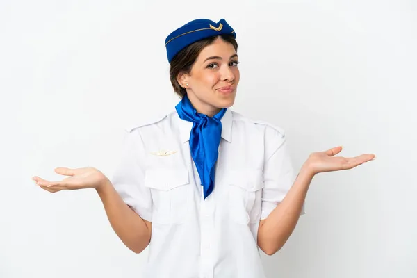 Stewardessa Samolot Kaukaska Kobieta Izolowana Białym Tle Mając Wątpliwości Podczas — Zdjęcie stockowe