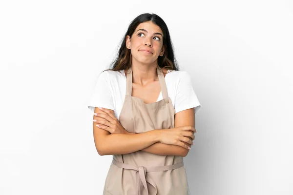 Cameriere Ristorante Sfondo Bianco Isolato Facendo Dubbi Gesto Mentre Solleva — Foto Stock