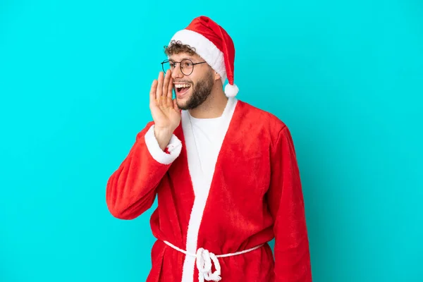 Young Man Disguised Santa Claus Isolated Blue Background Shouting Mouth — Stock Photo, Image
