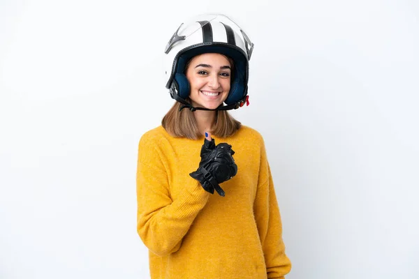 若いですCaucasian女性とともにオートバイヘルメット隔離上の白い背景与えます親指アップジェスチャー — ストック写真