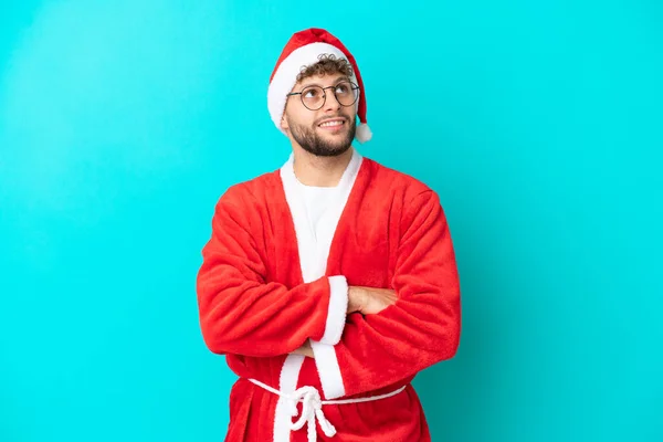 Young Man Disguised Santa Claus Isolated Blue Background Looking While — Stock Photo, Image