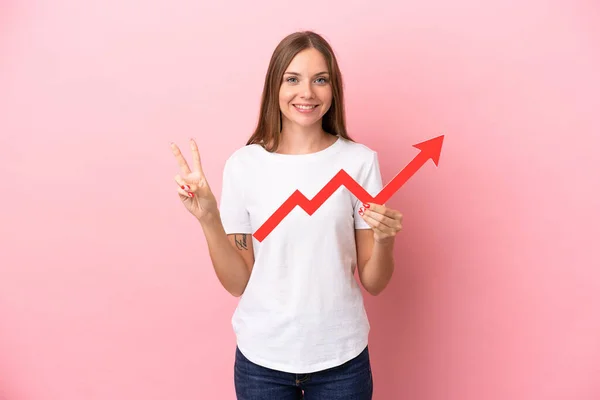 Young Lithuanian Woman Isolated Pink Background Holding Catching Rising Arrow — Stockfoto