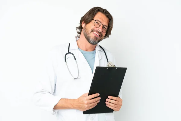 Senior Dutch Man Isolated White Background Wearing Doctor Gown Holding — Stock Photo, Image