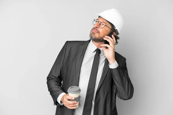 Young Architect Man Helmet Isolated Background Holding Coffee Take Away — Stock Photo, Image