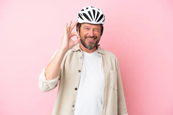 Senior Dutch Man Bike Helmet Isolated Pink Background Showing Sign — Stock Photo, Image