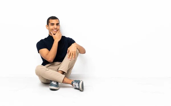 African American Man Sitting Floor Smiling — 图库照片