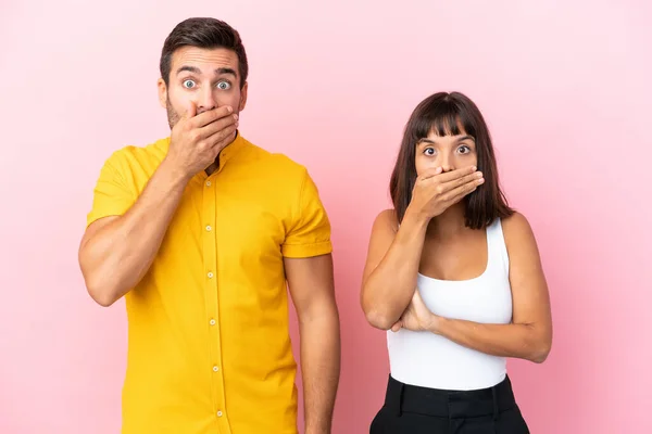 Young Couple Isolated Pink Background Covering Mouth Hands Saying Something — Stock Photo, Image