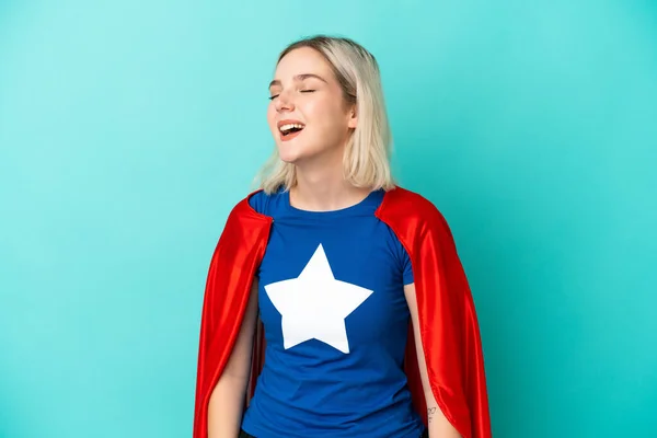 Super Hero Caucasian Woman Isolated Blue Background Laughing Lateral Position — Stock Photo, Image