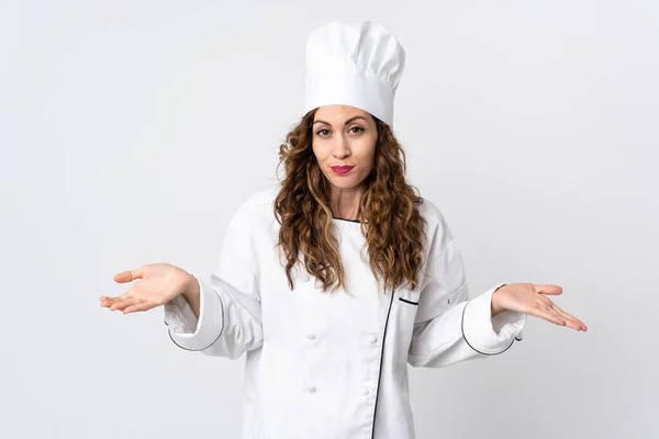 Joven Chef Mujer Aislada Sobre Fondo Blanco Teniendo Dudas Mientras —  Fotos de Stock