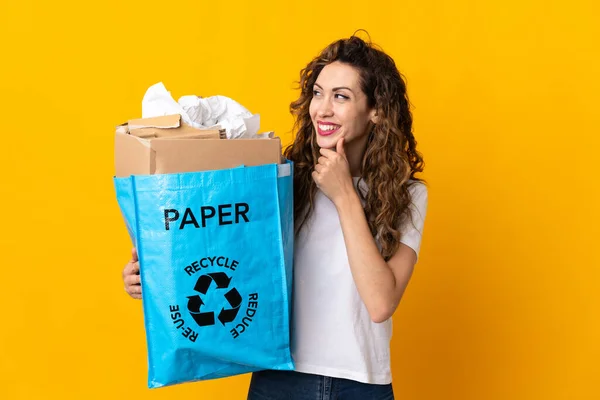 Young Woman Holding Recycling Bag Full Paper Recycle Isolated Yellow — Stock Photo, Image
