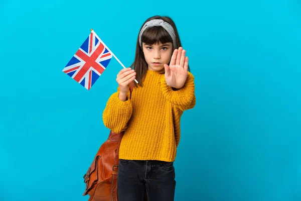 Mała Dziewczynka Studiuje Angielski Odizolowany Niebieskim Tle Stop Gest — Zdjęcie stockowe