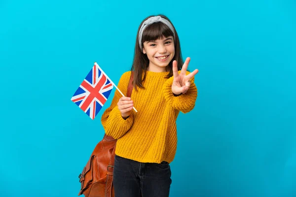 배경에 고립된 영어를 공부하고 소녀는 행복해 하면서 손가락으로 — 스톡 사진