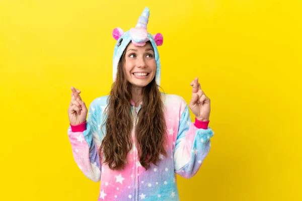 Girl Unicorn Pajamas Isolated Background Fingers Crossing — Stock Photo, Image