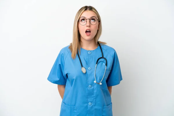 Young Surgeon Doctor Woman Isolated White Background Looking Surprised Expression — Stock Photo, Image