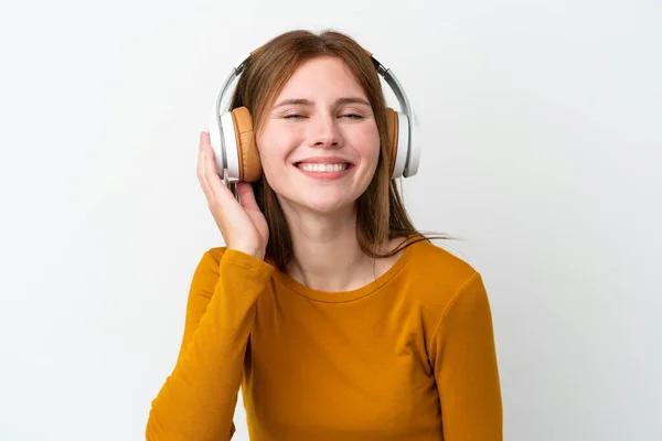 Joven Mujer Inglesa Aislada Sobre Fondo Blanco Escuchando Música — Foto de Stock