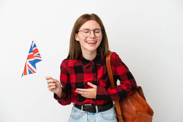 Mladá Žena Drží Vlajku Spojeného Království Izolované Modrém Pozadí Úsměvem — Stock fotografie
