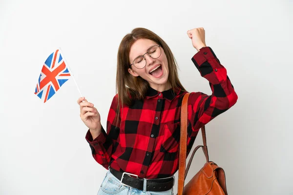 Young Woman Holding United Kingdom Flag Isolated Blue Background Celebrating — Stock Photo, Image