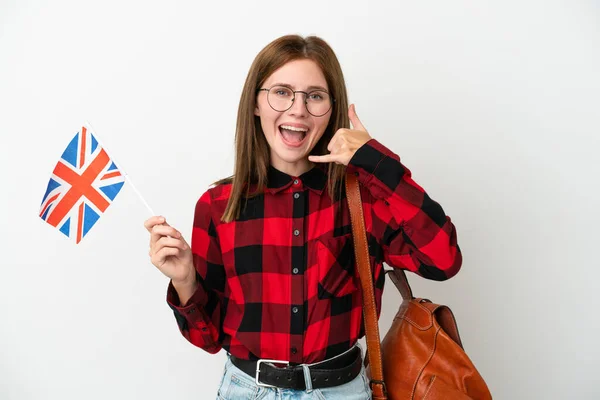 Jovem Segurando Uma Bandeira Reino Unido Isolada Fundo Azul Fazendo — Fotografia de Stock