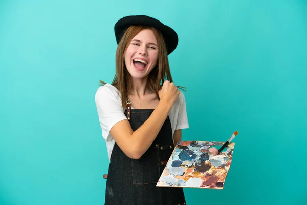 Joven Artista Inglesa Sosteniendo Una Paleta Aislada Sobre Fondo Azul —  Fotos de Stock