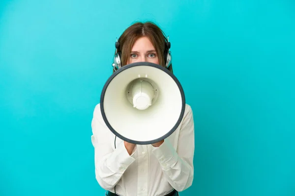Telemarketer Russian Woman Working Headset Isolated Blue Background Shouting Megaphone — стоковое фото