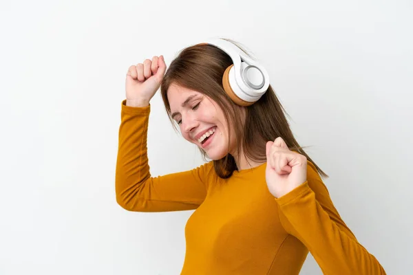 Joven Mujer Inglesa Aislada Sobre Fondo Blanco Escuchando Música Bailando — Foto de Stock