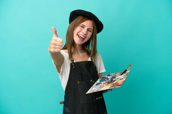 Joven Artista Inglesa Sosteniendo Una Paleta Aislada Sobre Fondo Azul —  Fotos de Stock