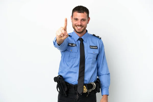 Młody Policjant Brazylijczyk Człowiek Odizolowany Białym Tle Pokazując Podnosząc Palec — Zdjęcie stockowe