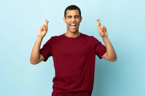 African American Man Isolated Background Fingers Crossing — Stock Photo, Image