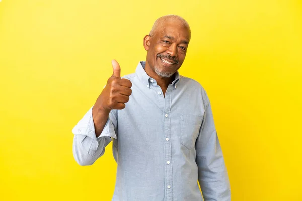 Cuban Senior Isolated Yellow Background Giving Thumbs Gesture — Stock Photo, Image