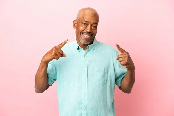 Cuban Senior Isolated Pink Background Giving Thumbs Gesture — Stock Photo, Image