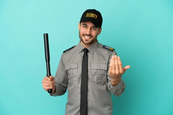 Young Security Man Isolated Blue Background Inviting Come Hand Happy — Foto Stock