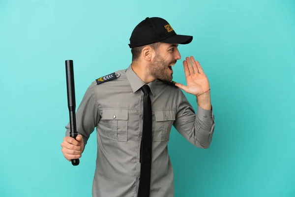 Young Security Man Isolated Blue Background Shouting Mouth Wide Open — Foto Stock