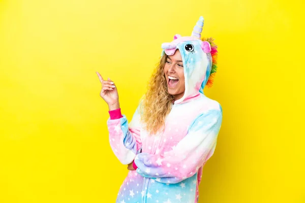 Girl Curly Hair Wearing Unicorn Pajama Isolated Yellow Background Pointing — Stock Photo, Image