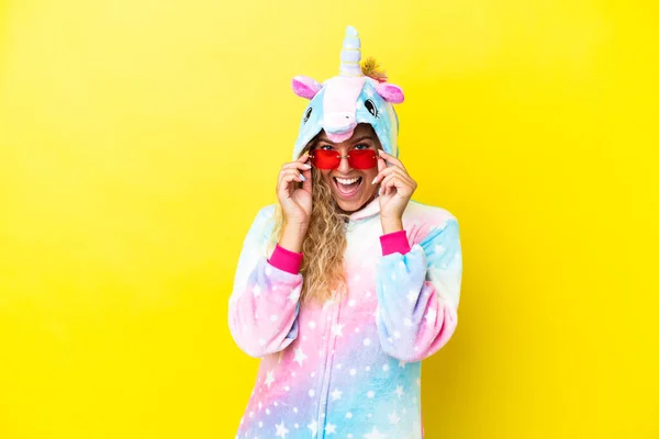 Girl Curly Hair Wearing Unicorn Pajama Isolated Yellow Background Glasses — Stock Photo, Image