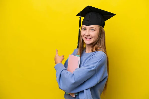Young Student Russian Woman Isolated Yellow Background Pointing Back — Fotografia de Stock