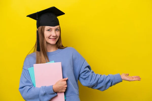 Young Student Russian Woman Isolated Yellow Background Extending Hands Side — Foto Stock