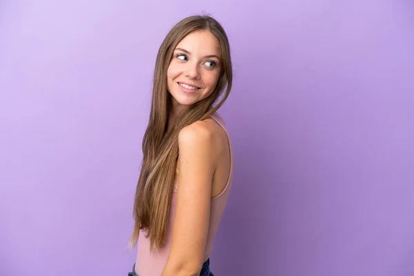 Young Lithuanian Woman Isolated Purple Background Looking Side Smiling — Stock Photo, Image