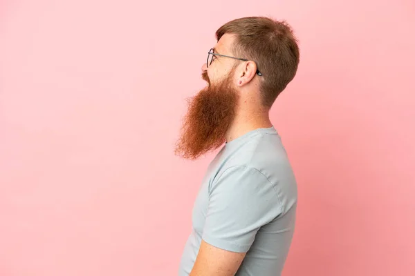 Young Reddish Caucasian Man Isolated Pink Background Lateral Position — Stock Photo, Image