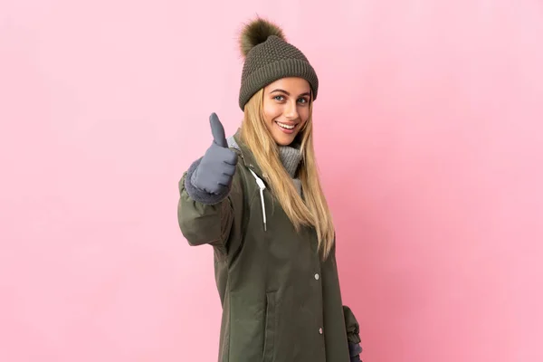 Young Woman Winter Hat Isolated Pink Background Thumbs Because Something — Foto Stock