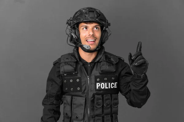 Swat Caucasian Man Isolated Grey Background Pointing Surprised — Stockfoto