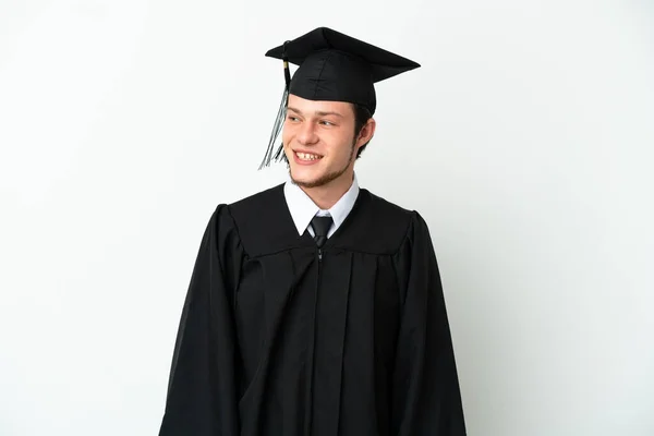 Universidad Joven Ruso Graduado Aislado Sobre Fondo Blanco Mirando Lado — Foto de Stock
