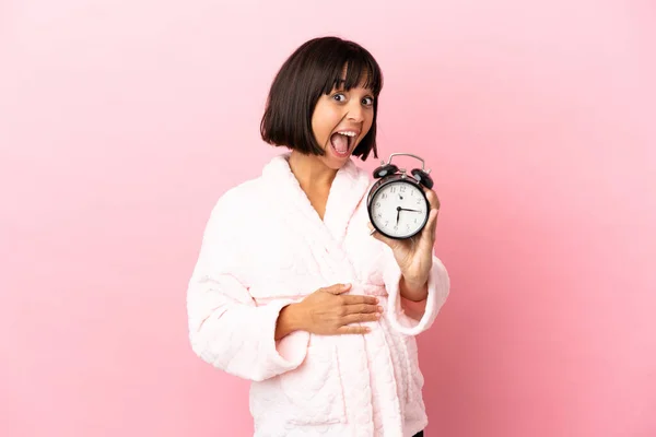 Young Mixed Race Pregnant Woman Isolated Pink Background Pajamas Holding — Foto Stock