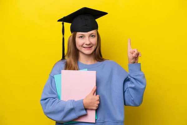 Young Student Russian Woman Isolated Yellow Background Pointing Great Idea — Fotografia de Stock