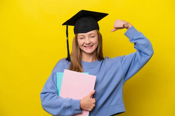 Young Student Russian Woman Isolated Yellow Background Doing Strong Gesture — Foto Stock
