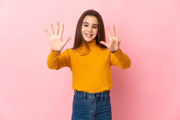 Little Girl Isolated Pink Background Counting Eight Fingers — Stockfoto