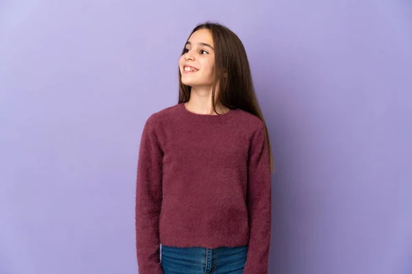 Little Girl Isolated Purple Background Thinking Idea While Looking — Fotografia de Stock