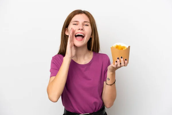 Young English Woman Holding Fried Chips Isolated White Background Shouting — Stock Photo, Image