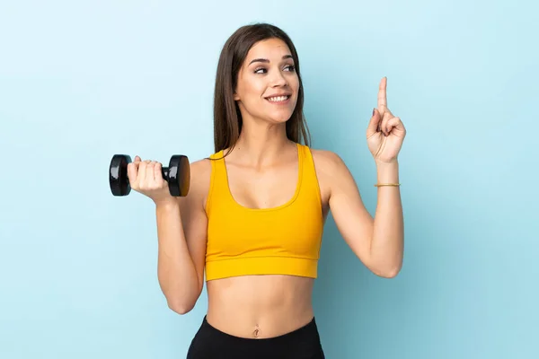 Young Caucasian Woman Making Weightlifting Isolated Blue Background Intending Realizes — Foto Stock