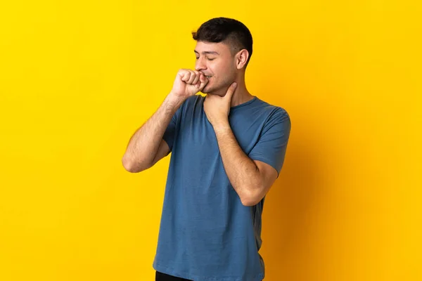 Young Colombian Man Isolated Yellow Background Coughing Lot — Stockfoto